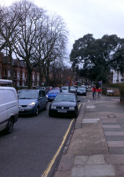The photo for Kew Road - no cycling provision, pavement cycling.